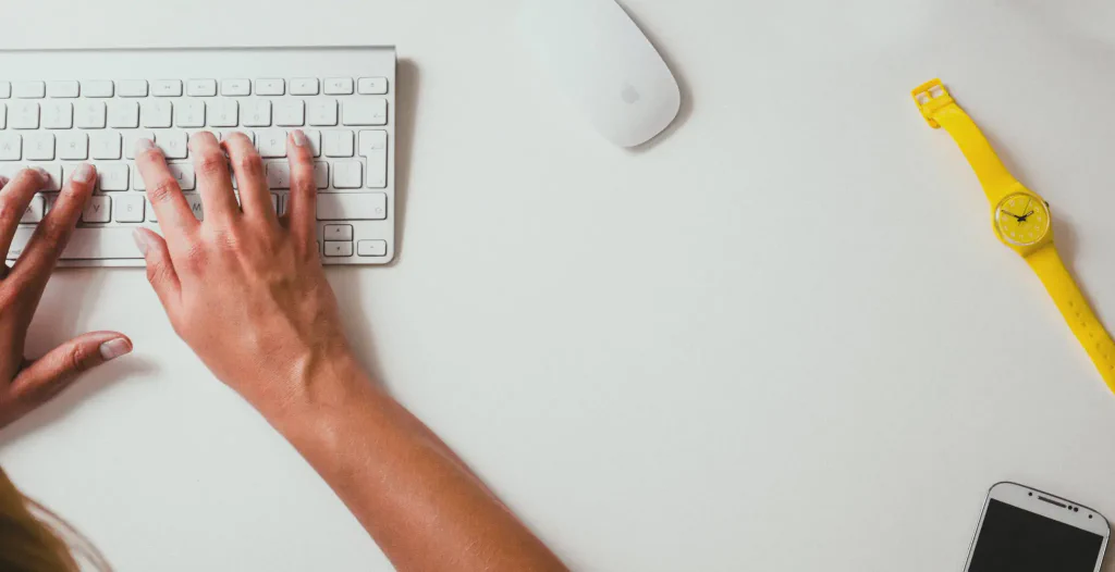 user typing on keyboard