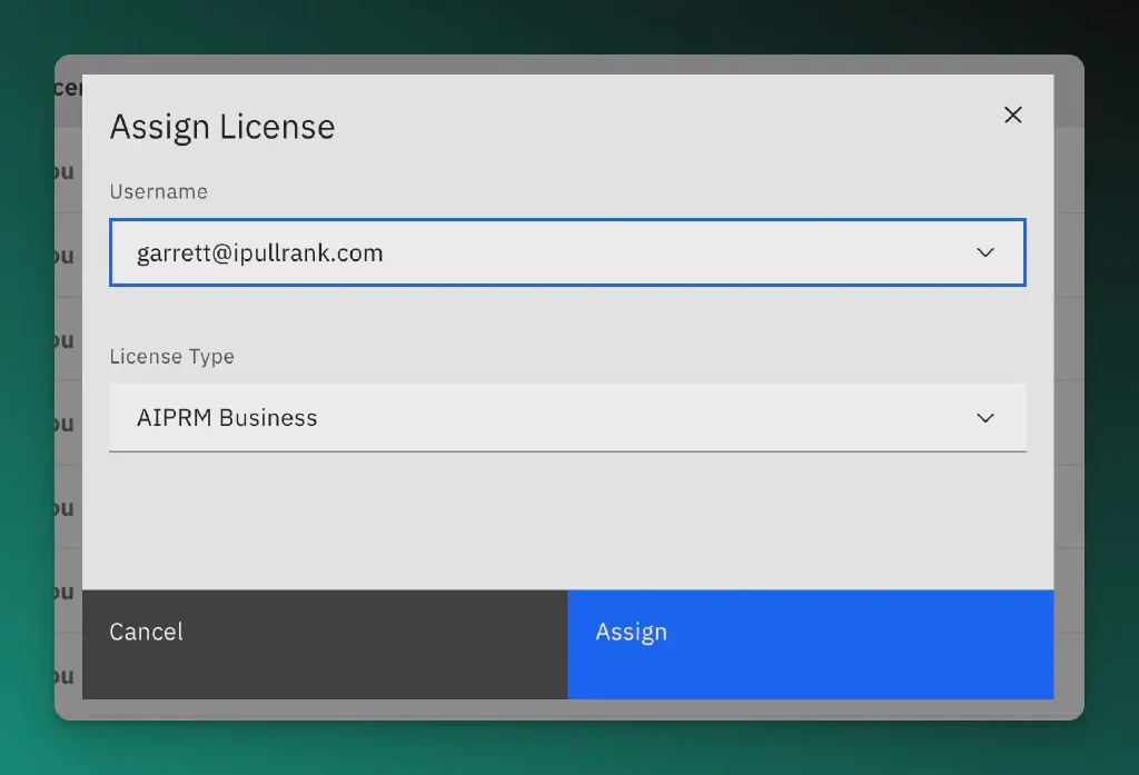 Screenshot of the AIPRM assign license window with an email address highlighted.